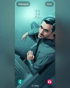 RON seated, thoughtfully gazing in a modern artistic setting: Download free mobil wallpaper&nbsp;9:21